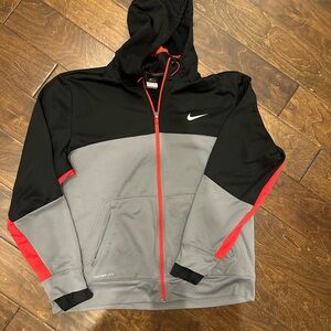 Nike Men's Black and Gray Performance Jacket with Red Highlights